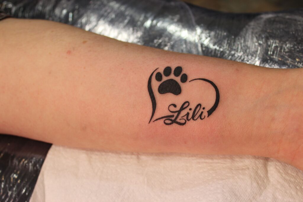 dog paw tattoo with name